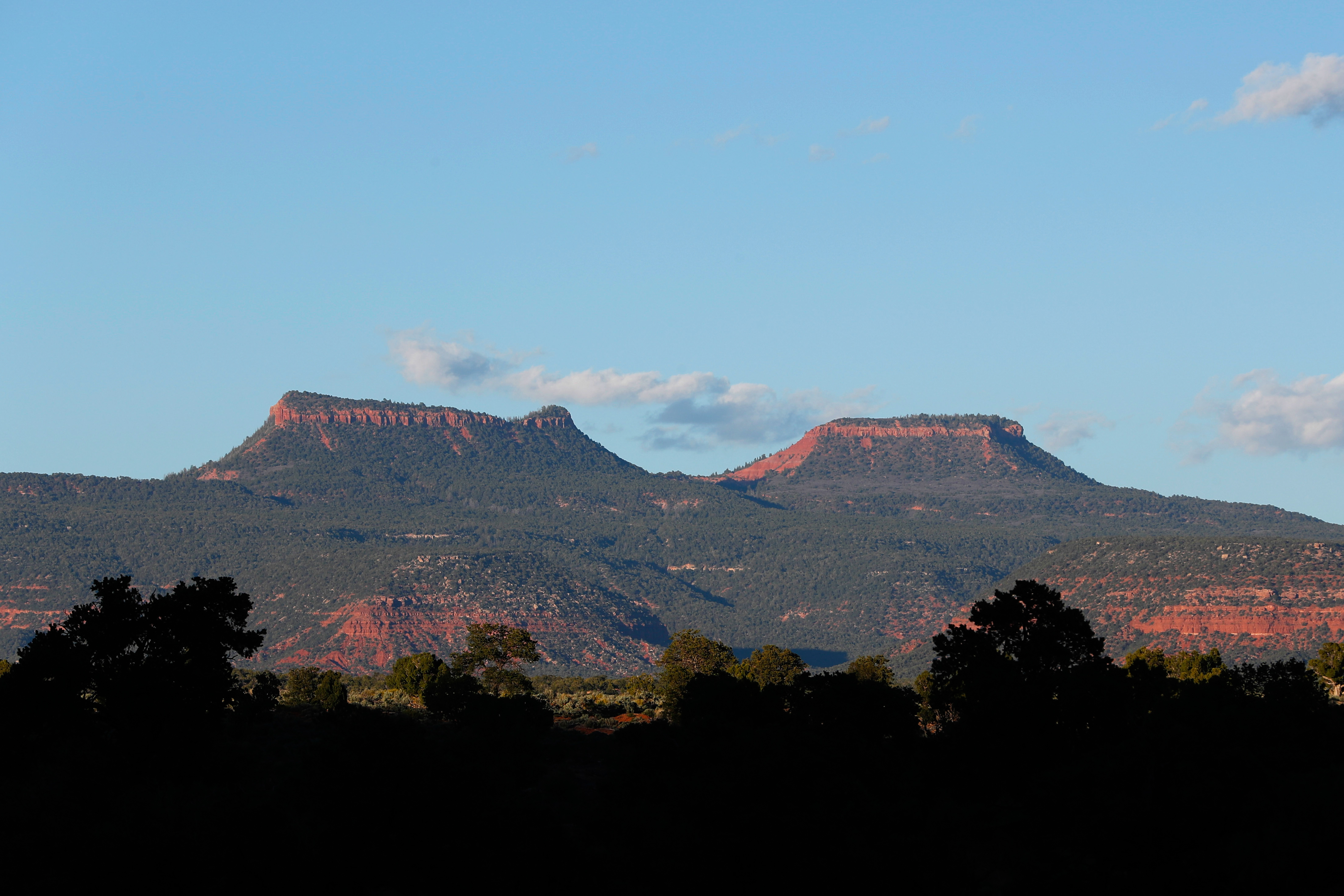 The two bluffs known as the Bears Ears are seen at sunset in the Bears Ears National Monument. The two bluffs known as the Bears Ears are seen at sunset in the Bears Ears National Monument.