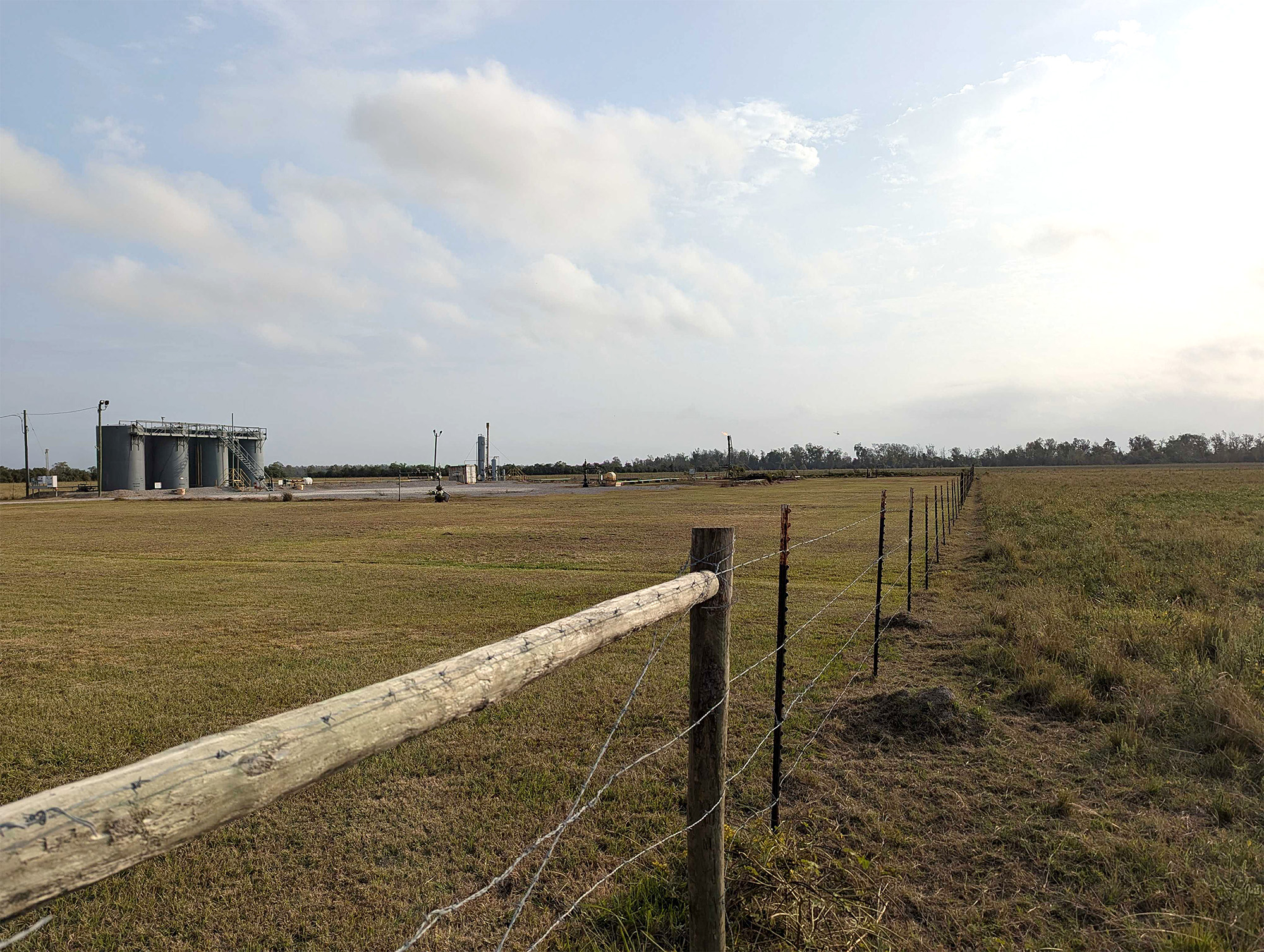 A Badger Energy flare stack burns gas next to where Climeworks plans to build a facility capable of removing up to 1 million metric tons of CO2 per year from the atmosphere. A Badger Energy flare stack burns gas next to where Climeworks plans to build a facility capable of removing up to 1 million metric tons of CO2 per year from the atmosphere.