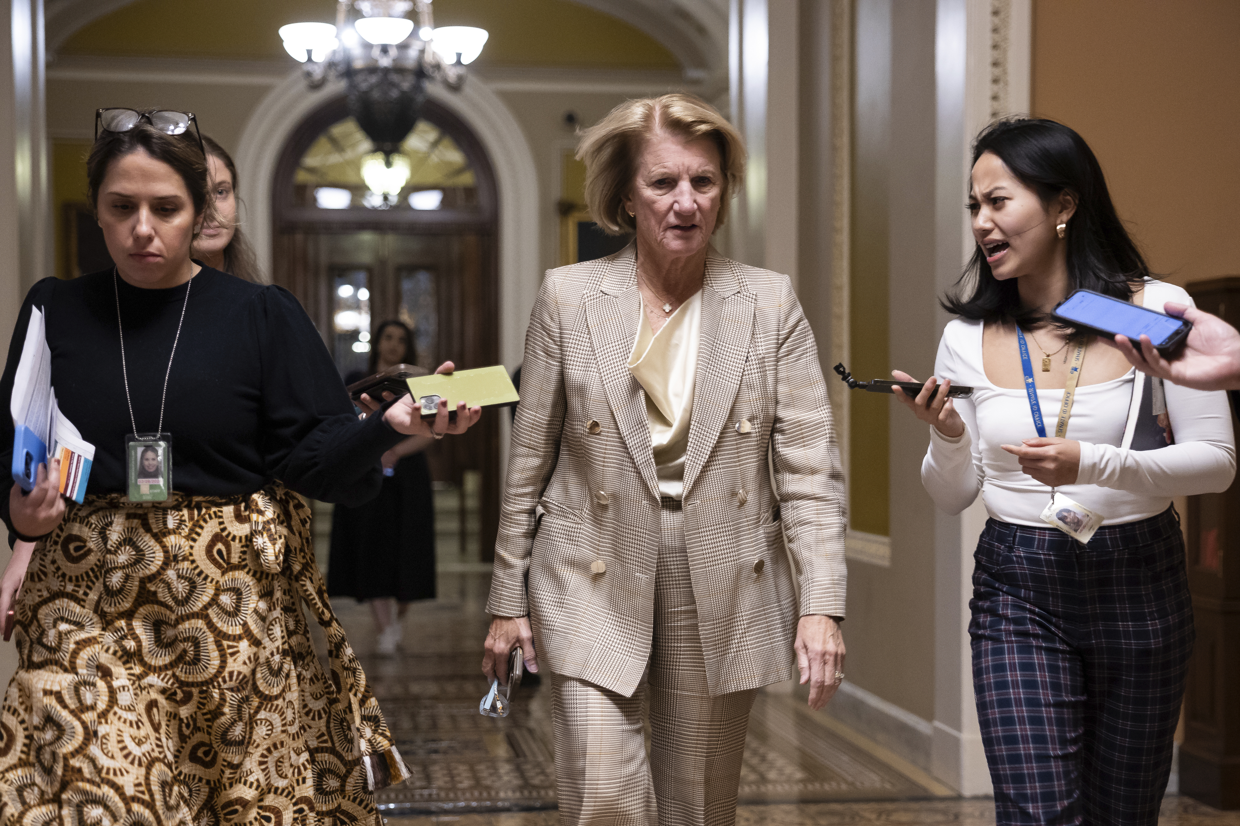 Sen. Shelley Moore Capito (R-W.Va.) speaks with reporters as she walks in the U.S. Capitol. Sen. Shelley Moore Capito (R-W.Va.) speaks with reporters as she walks in the U.S. Capitol.